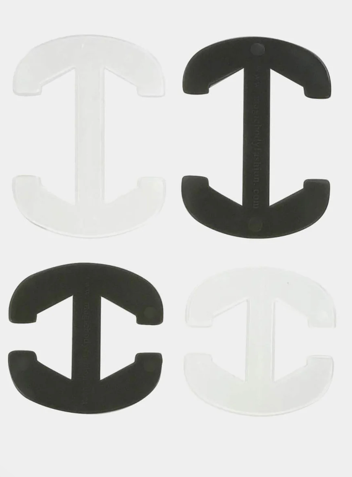 Two black and two clear plastic anchor-shaped clips on a white background