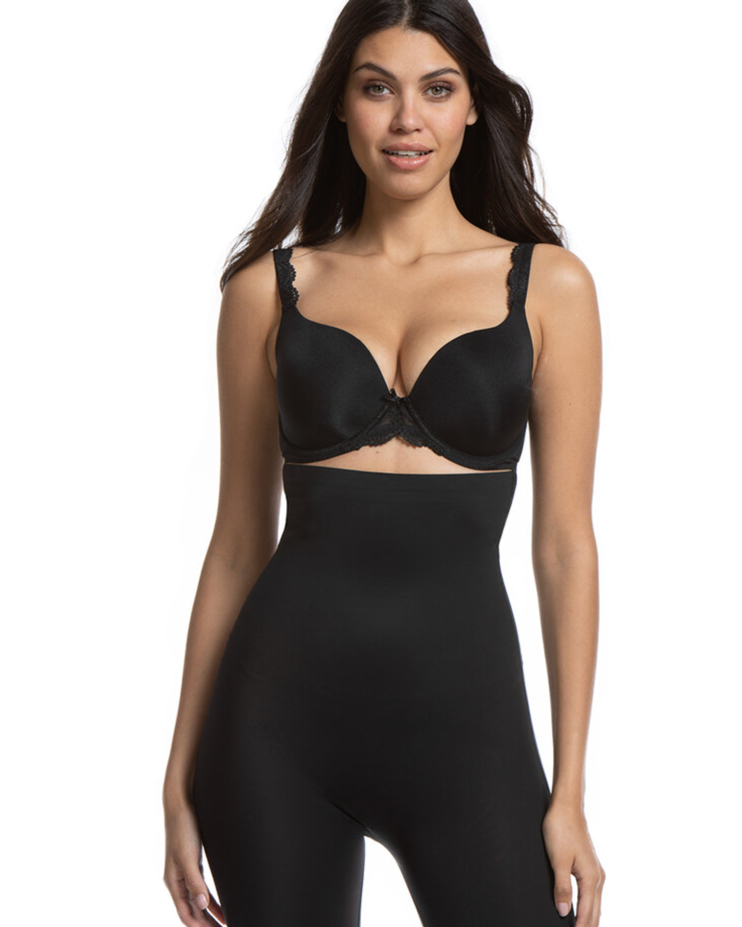 Woman wearing a black shapewear bodysuit on a white background