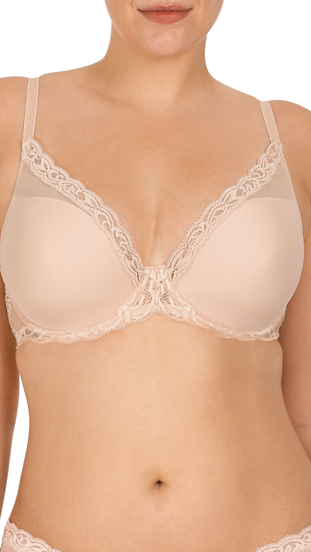 Beige bra with lace details on a white background