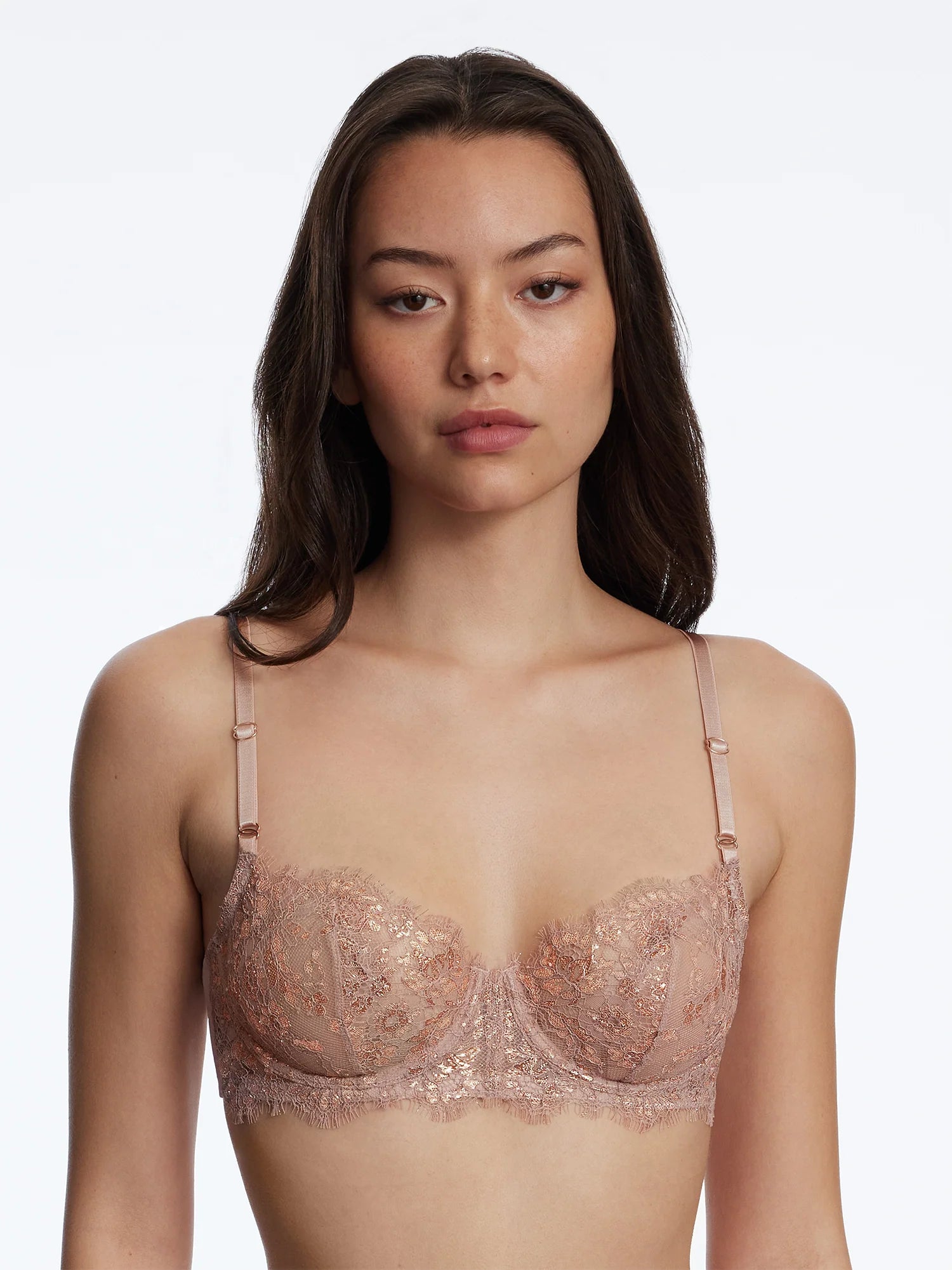 The back view of Skarlett Blue Entice Balconette Bra in Rose Gold highlighting the buttery soft fabric back band.