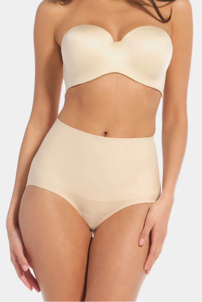 The Tummy Shaper is a beautiful brief that provides firm smooth shape at the abdomen and lower back.