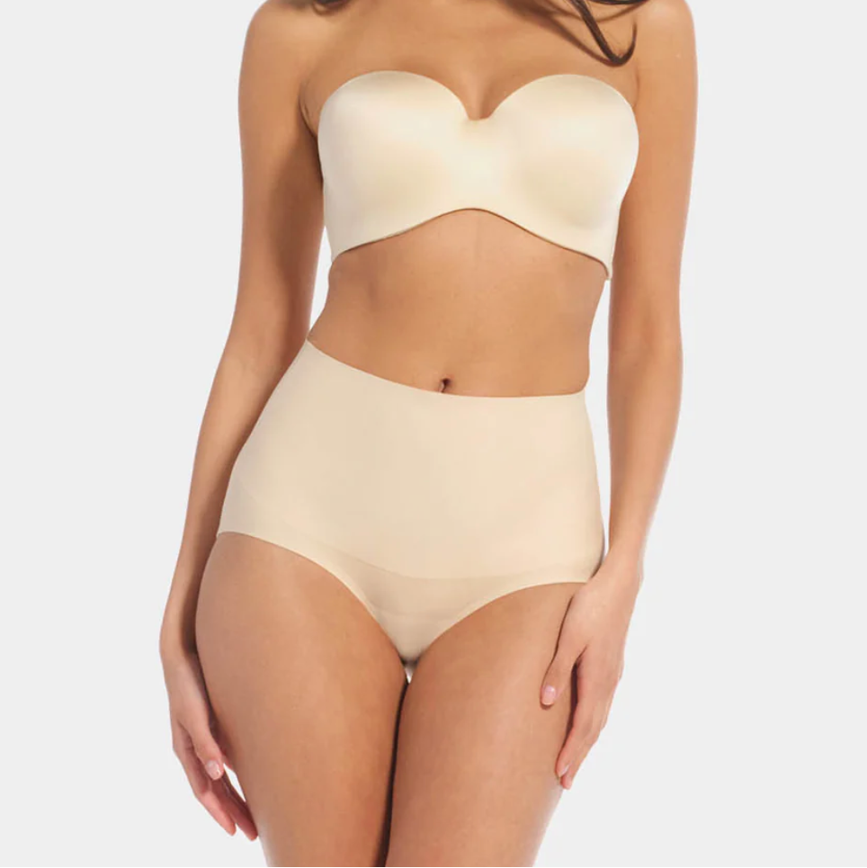 The Tummy Shaper is a beautiful brief that provides firm smooth shape at the abdomen and lower back.