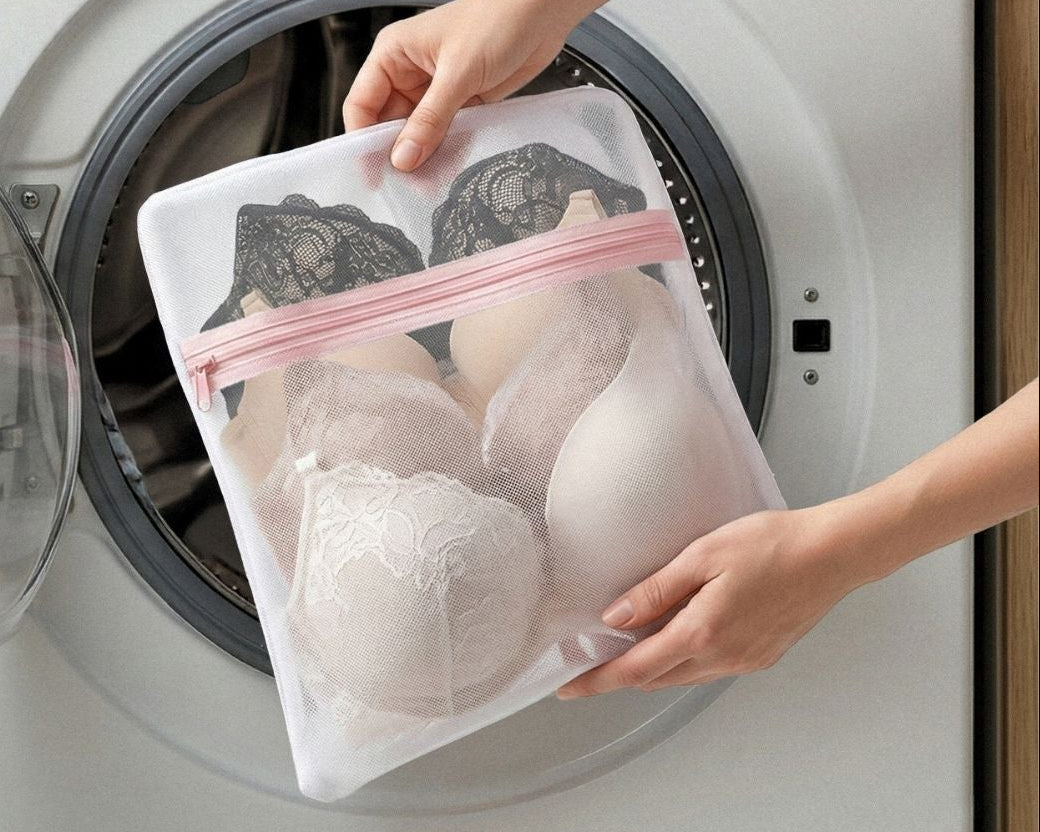 Person placing a mesh bag with bras into a washing machine, with text about the $4 bag for good.