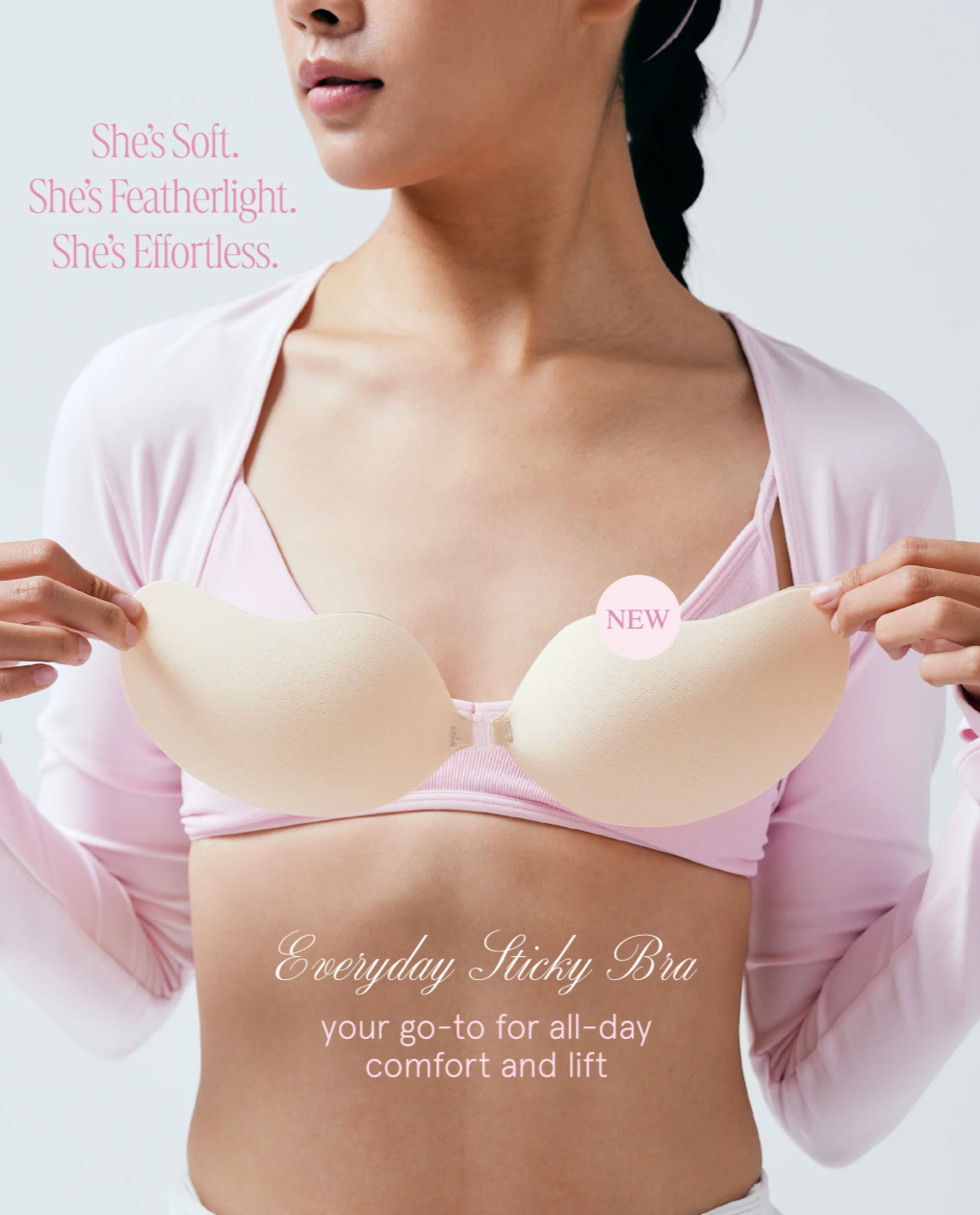 Woman wearing a pink Everyday Sticky Bra with promotional text on a light gray background