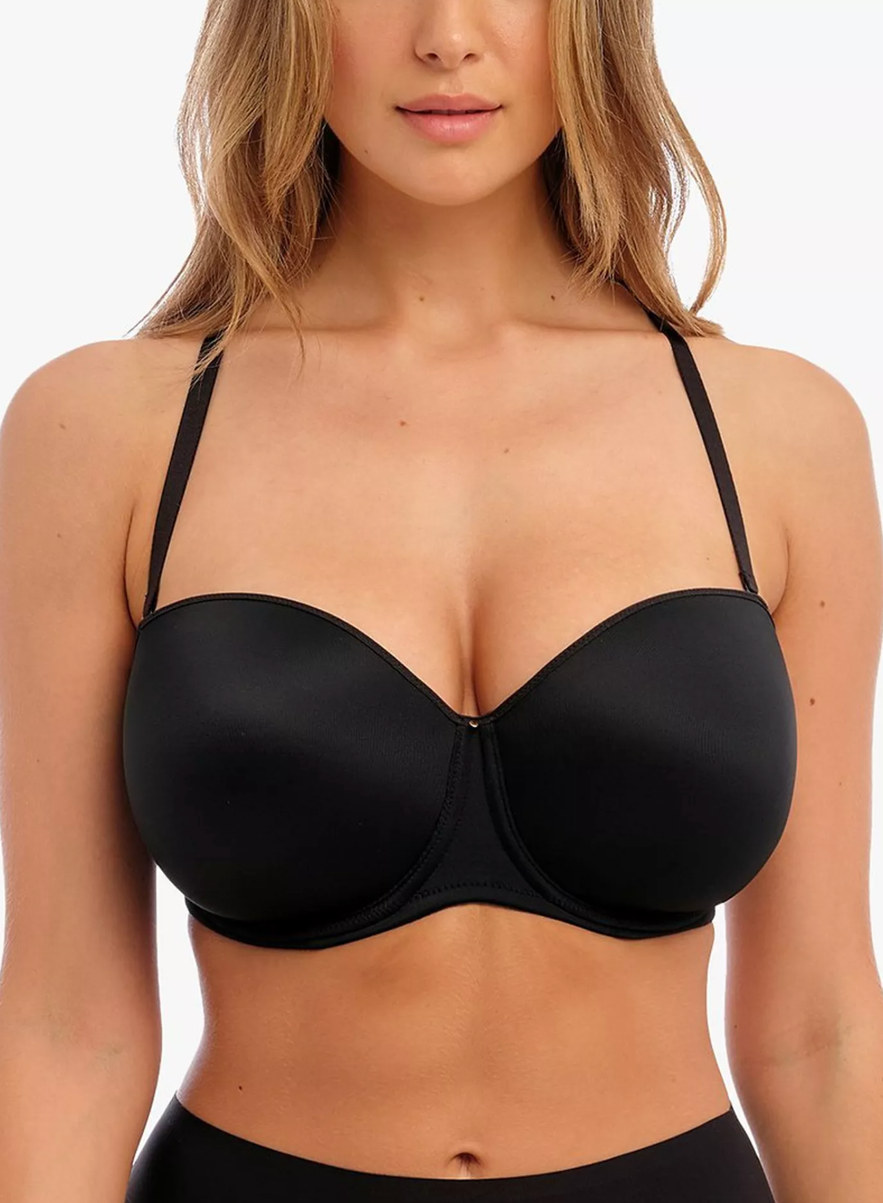 Black bra strapless worn by a model on a white background