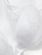 Close-up of a textured white fabric with intricate patterns