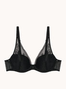 Black bra with lace details on a white background