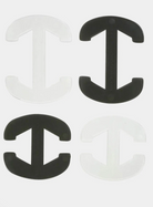 Two black and two clear plastic anchor-shaped clips on a white background