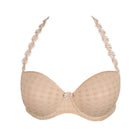 Beige bra with floral lace straps on a white background