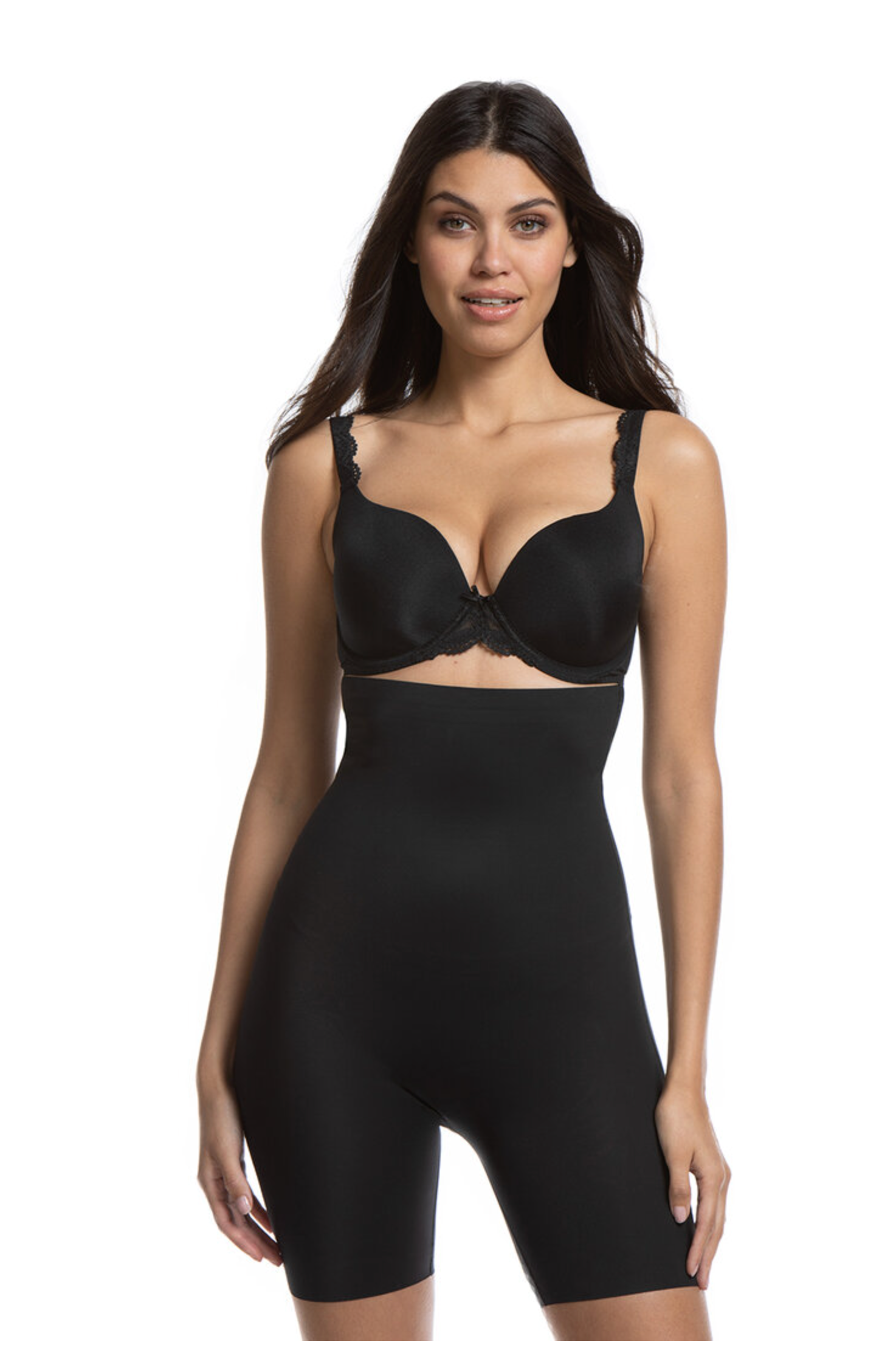 Woman wearing a black shapewear bodysuit on a white background
