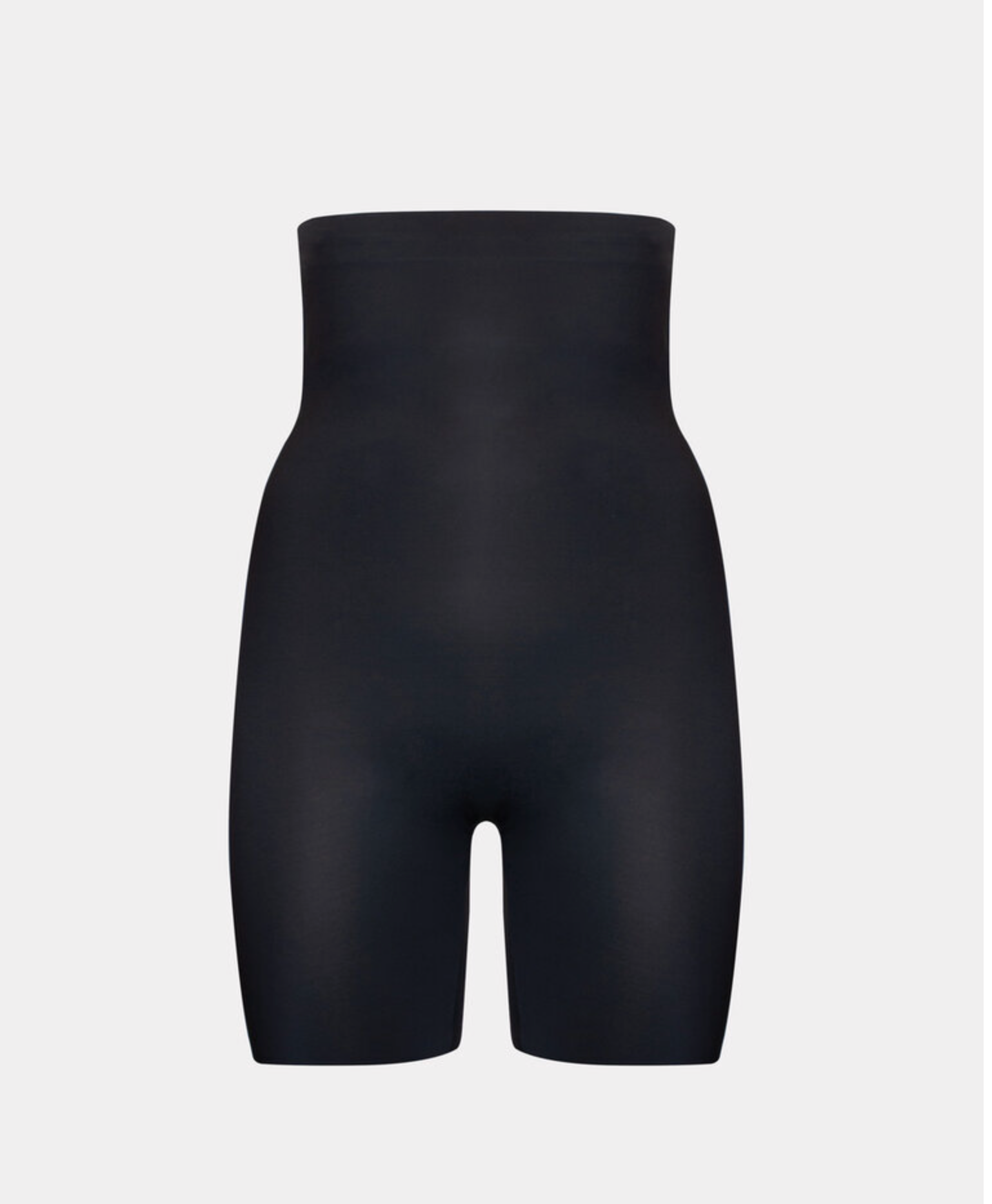 Black high-waisted shapewear on a light gray background
