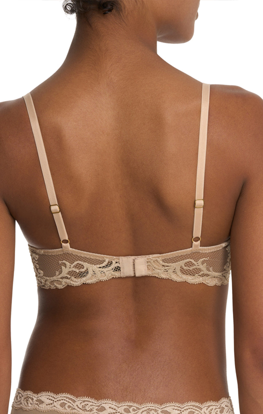 Beige lace bra on a model with a white background