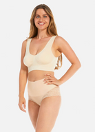 Woman wearing tummy shaper smooth brief